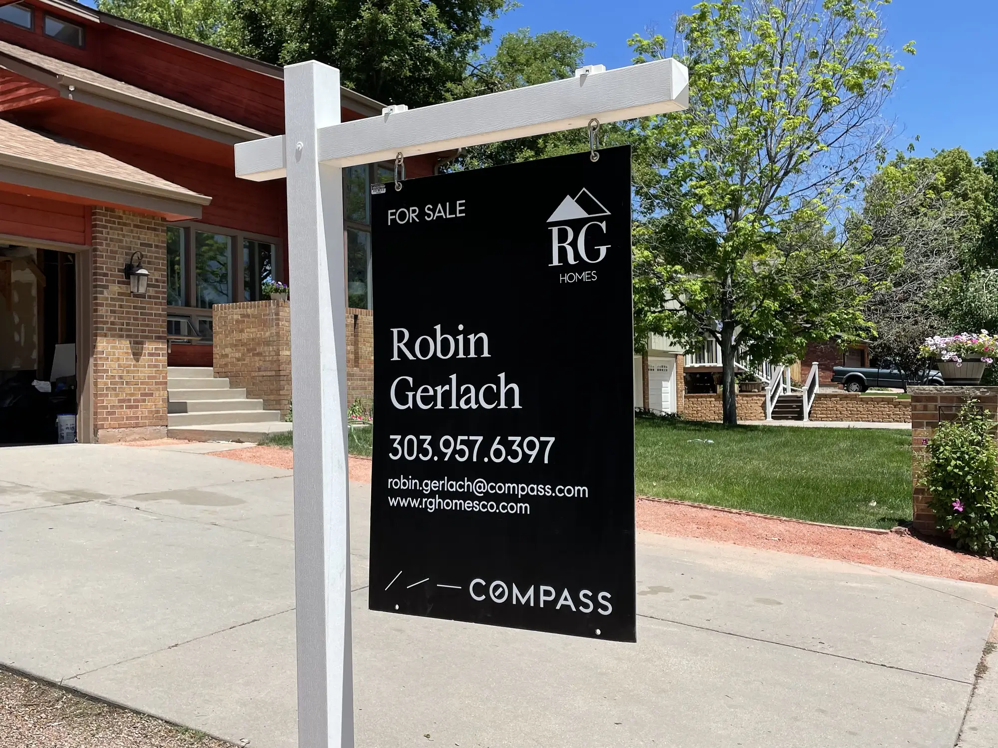 Robin Gerlach "For Sale" sign outside a Denver home